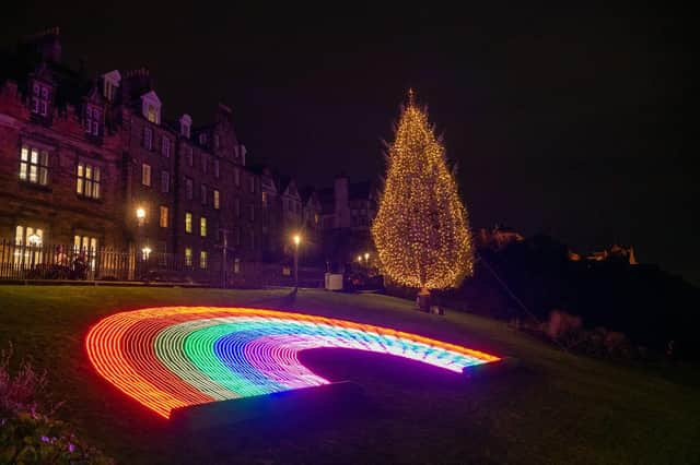 An 18 metre Christmas Rainbow accompanies the traditional Christmas tree on The Mound  this year