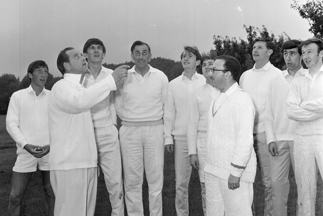 Here you can see a public park six-a-side cricket event taking place in The Meadows, with B Reid and R Bindman at the coin toss. Year: 1965