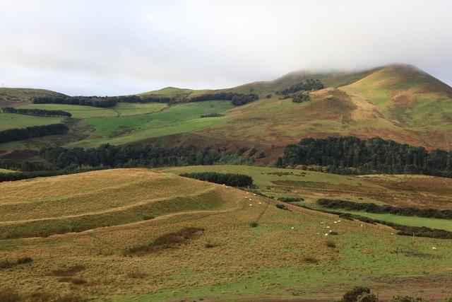 Consisting of a series of earthwork ditches and bank put in place to protect a circular-shaped centre, Iron Age Castlelaw enjoys a picturesque setting in the heart of the Pentland Hills.