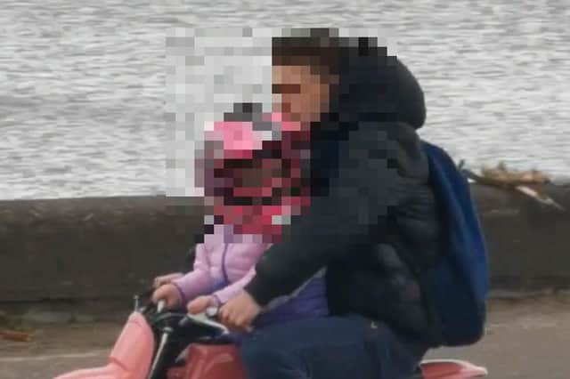 A man and a young child appeared to be riding a small pink motorbike alongside four other bikers in Silverknowes on Sunday afternoon.