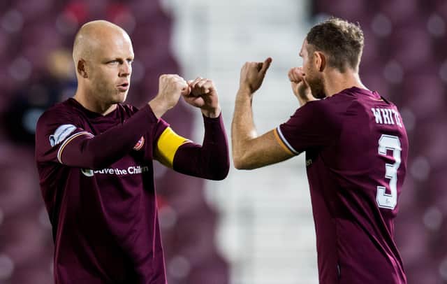 Hearts captain Steven Naismith with defender Aidy White.