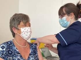 Elizabeth Anne Kirk, being given the vaccine at the Royal Highland Centre, Ingliston, on Wednesday.