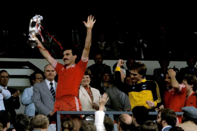 Aberdeen captain Willie Miller lifts the Scottish Cup after the Pittodrie side beat Rangers 4-1 in the 1981/82 final. Photo by SNS Group