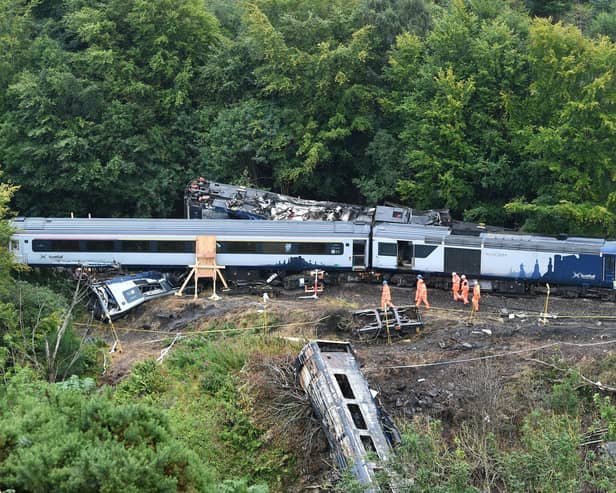 The front section of the High Speed Train in the Carmont crash is in the bottom right of the picture, partially concealed by undergrowth. Picture: John Devlin