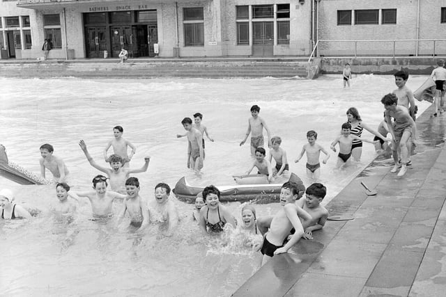 Children play in Portobello Outdoor Swimming Pool in summer 1965.