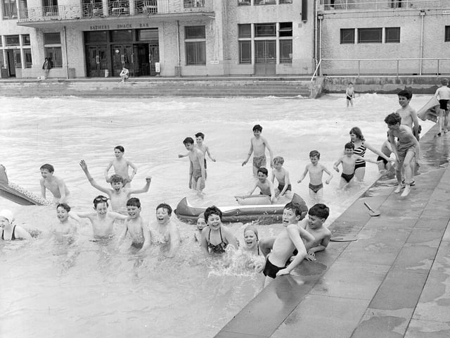 Children play in Portobello Outdoor Swimming Pool in summer 1965.
