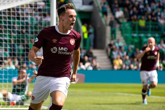 Lawrence Shankland celebrates after scoring to put Hearts 1-0 up over Hibs at Easter Road. Picture: SNS