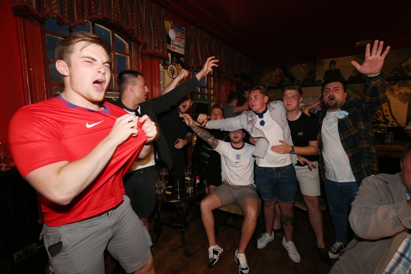 Celebrations at full-time. Fans watch England v Ukraine in the quarter finals of Euro 2020, in The Kings pub, Albert Rd, Southsea. Picture: Chris Moorhouse (jpns 030721-21)