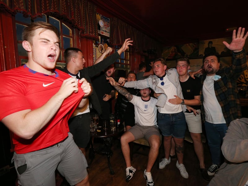 Celebrations at full-time. Fans watch England v Ukraine in the quarter finals of Euro 2020, in The Kings pub, Albert Rd, Southsea. Picture: Chris Moorhouse (jpns 030721-21)