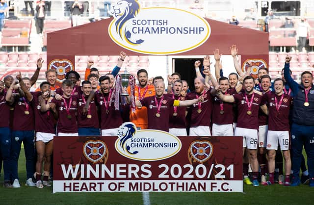 Hearts celebrate winning the Championship title in April.