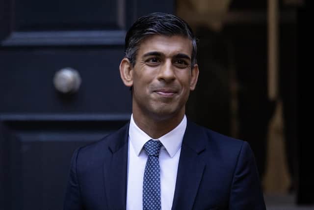 New Conservative Party leader and incoming prime minister Rishi Sunak waves as he leaves the Conservative Party Headquarters after having been announced as the winner of the Conservative Party leadership contest on October 24, 2022 in London, England.