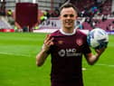 Hearts captain Lawrence Shankland with the match ball after his hat-trick against Ross County.