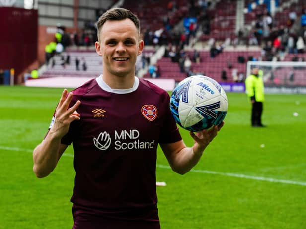 Hearts captain Lawrence Shankland with the match ball after his hat-trick against Ross County.