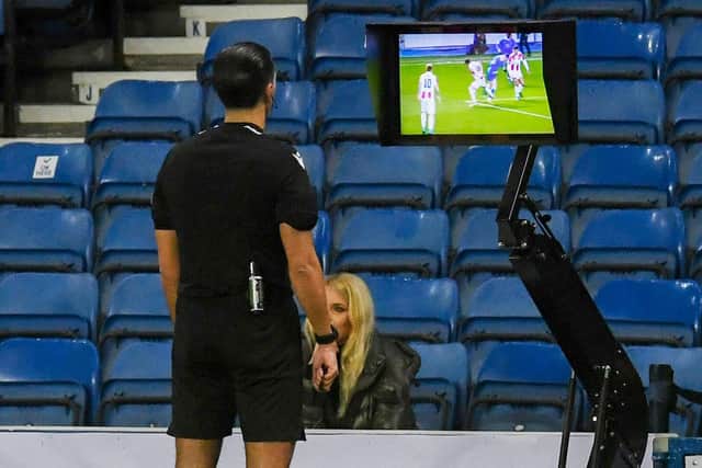 Referee Serdar Gözübüyük reviews the VAR monitor for a potential penalty during Rangers' Europa League encounter with Red Star Belgrade earlier this season. Picture: SNS