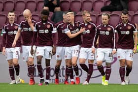 Hearts players celebrate Stephen Kingsley's goal against Motherwell.