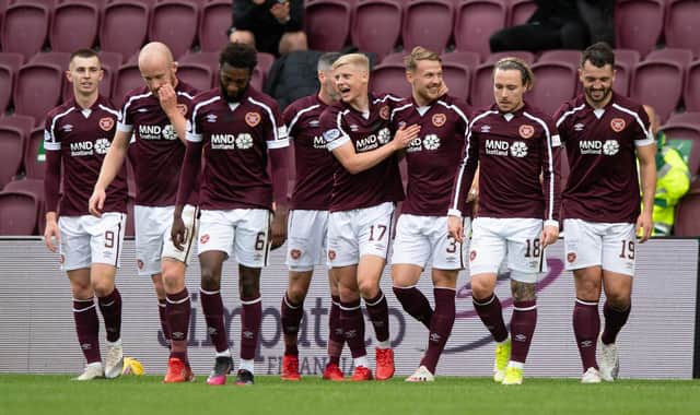 Hearts players celebrate Stephen Kingsley's goal against Motherwell.