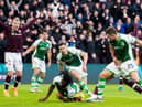 Hibs defender Rocky Bushiri conceded a penalty, given by VAR, after the ball hit his arm against Hearts at Tynecastle on January 2