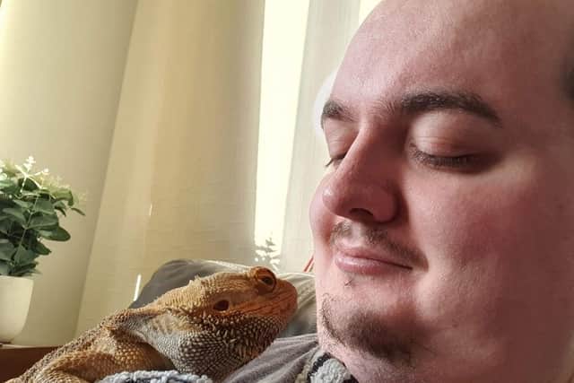 Pet owner Daryl Hunter is rarely without his lizard pal Wrex.