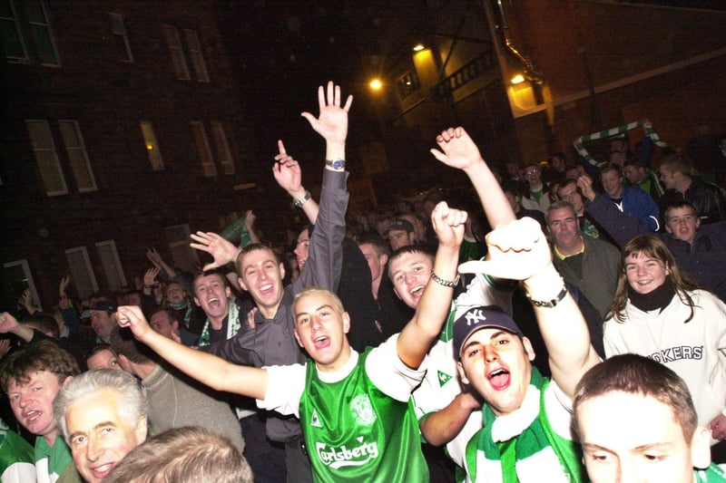 Jubilant Hibs fans make their way down Albion Road following the landmark 6-2 mauling of rivals Hearts on 22 October 2000.