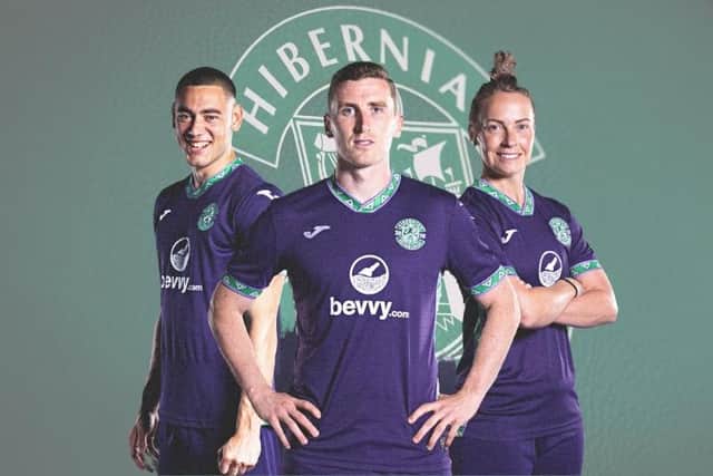 Lewis Miller, Paul Hanlon, and Joelle Murray model the new purple away kit. Picture: Hibernian FC