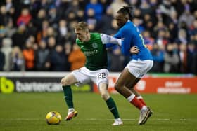 Jakes Doyle-Hayes, pictured holding off Joe Aribo, had arguably his best performance in a Hibs jersey