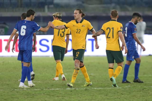Australia's midfielder Jackson Irvine. (Photo by YASSER AL-ZAYYAT/AFP via Getty Images)