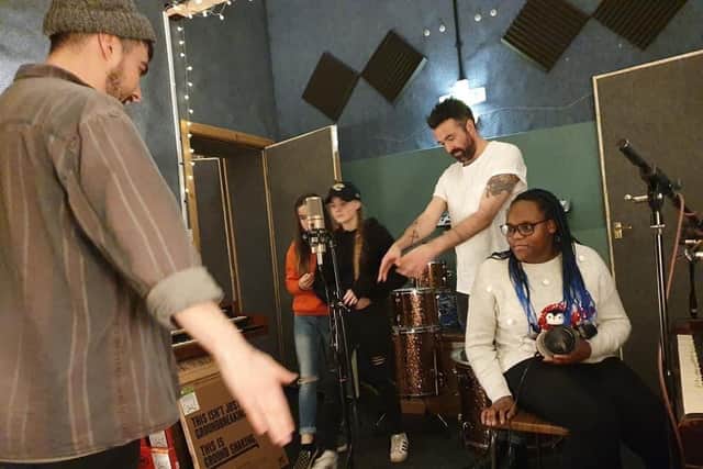 Mark and Ryan working with the young people in the studio