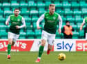 James Scott in possession for Hibs during the win over Ross County with Drey Wright behind him and Chris Cadden in the distance. Picture: SNS