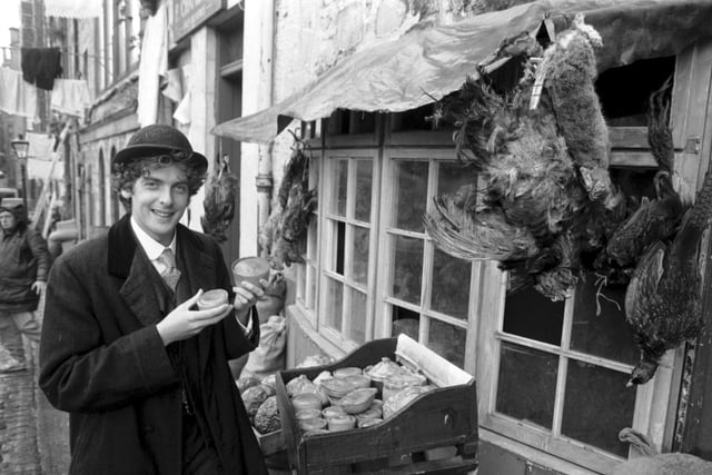 Scottish actor Peter Capaldi outside a pie and game shop in Niddry Street, recreated for filming BBC TV's 'The Story of a Recluse' in June 1987.