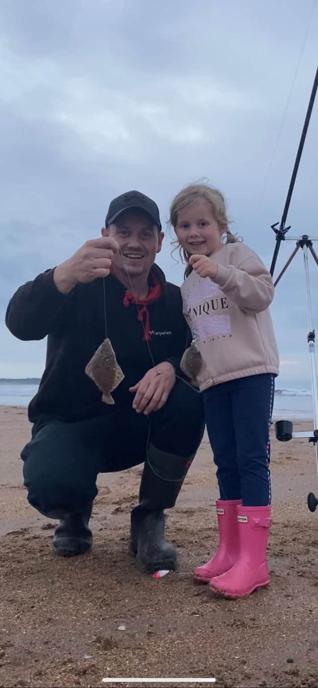 Chris Empson and his daughter Abby at a local beach. Picture: Nigel Duncan