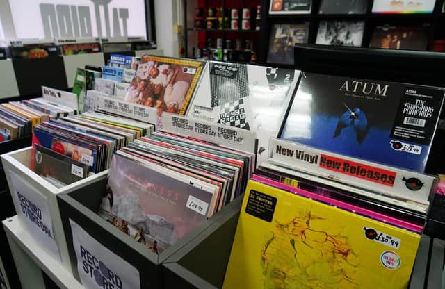 Picking up vinyl records, compact discs or t-shirts, which are displayed in order alphabetically and/or by genre, and putting them back in the wrong place will make it harder for other customers to find what they are looking for