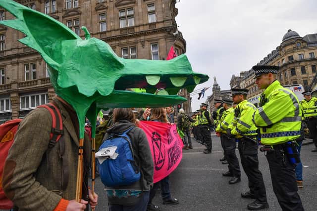 Climate change protesters block Edinburgh's North Bridge in 2019 (Picture: Jeff J Mitchell/Getty Images)
