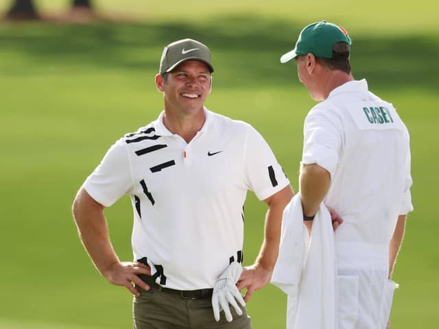 Paul Casey and caddie John McLaren talk during the first round of the Masters at Augusta National Golf Club. Picture: Rob Carr/Getty Images