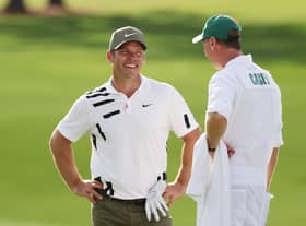 Paul Casey and caddie John McLaren talk during the first round of the Masters at Augusta National Golf Club. Picture: Rob Carr/Getty Images