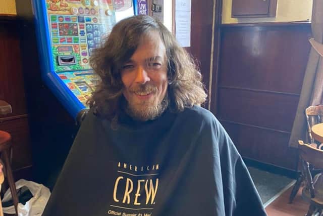 Barman Craig Ritchie spent two years growing his hair