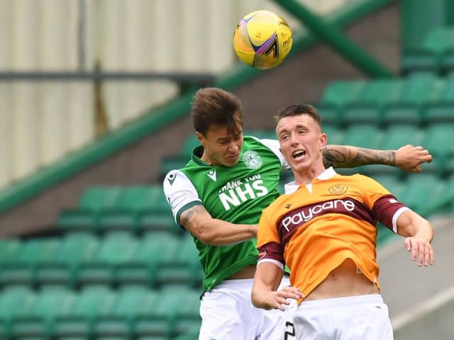 Melker Hallberg vies for the ball with Motherwell's David Turnbull