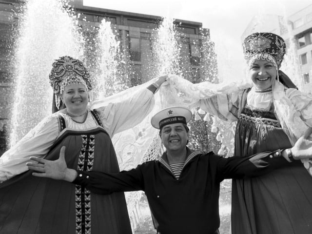 Russian folk singer Nadezhda Babkina brought her vocal ensemble 'Russkaya Pesnya' to Edinburgh in April 1989. Ms Babkina, wearing traditional costume, is pictured performing with the 'Red Navy Ensemble' in Festival Square.