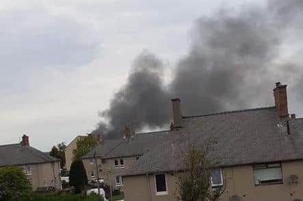Thick black smoke could be seen from Loanhead.