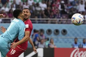 Iran's goalkeeper Alireza Beiranvand collides with defender Majid Hosseini, right, during the World Cup match against England in Qatar. Picture: Alessandra Tarantino /AP
