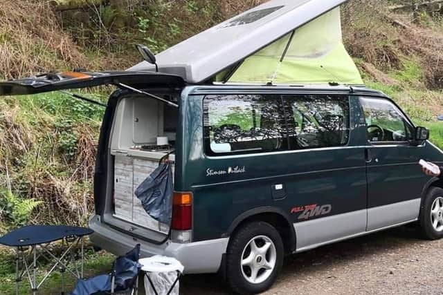 A small double bed in the roof and a double bed in the main van when the seats fold down mean this van can sleep three or four.