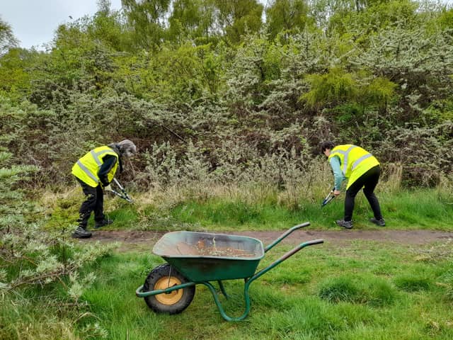 The Conservation Volunteers hard at work while keeping fit.