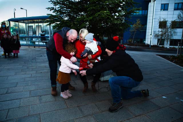 Joey and his family switch on the Christmas lights at the new children's hospital in Edinburgh