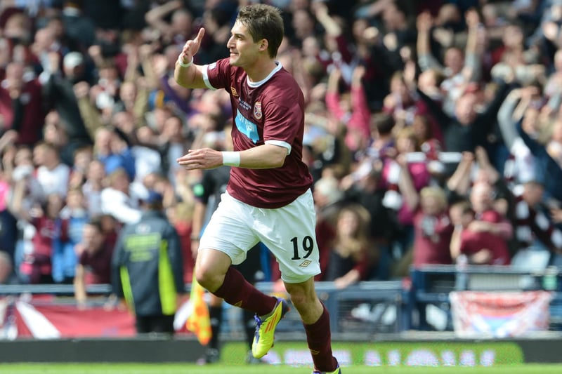 Another famous home top adored by Jambos. Pictured is Hearts Rudi Skacel as he celebrates after scoring the second Hearts goal in the famous Scottish Cup final 5-1 win over Hibs in 2012.  Pic Ian Rutherford