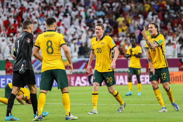 Australia goalkeeper Mathew Ryan celebrates, left to right, with teammates defender Bailey Wright, defender Kye Rowles and midfielder Jackson Irvine after winning the FIFA World Cup 2022 play-off qualifier against United Arab Emirates in Qatar. Picture: Karim Jaafar //Getty