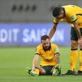 Martin Boyle goes down with an injury during Australia's 3-0 win over China last week