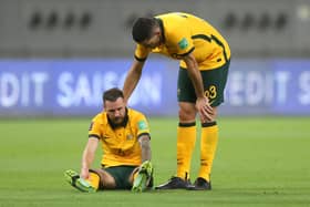 Martin Boyle goes down with an injury during Australia's 3-0 win over China last week