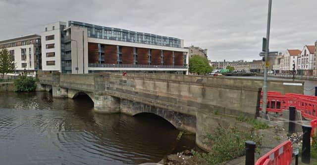 A man was rescued from the Water of Leith at Sandport Place by SFRS crews on Friday morning.