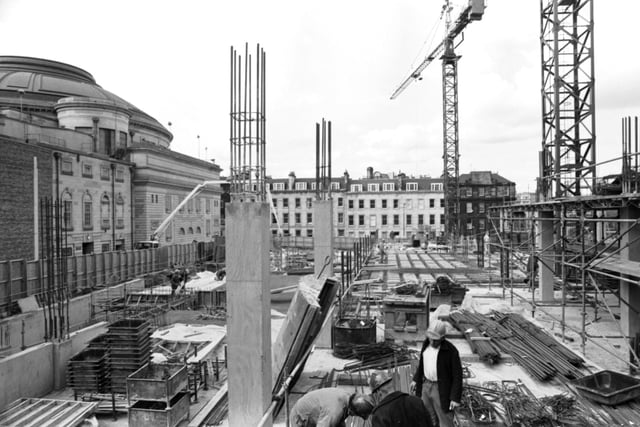 Construction continues at the gap-site next to the Usher Hall between Castle Terrace and Cambridge Street Lane  in Edinburgh, April 1990. Sited on the former Poole's Synod Hall, the building became Saltire Court.