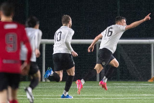 Josh Campbell wheels away after scoring the goal that booked Edinburgh City's place in the play-off final