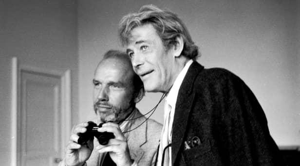 Evening News journalist John Gibson borrows actor Peter O'Toole's binoculars during the latter's visit to Edinburgh in August 1984 (Picture: Albert Jordan)
